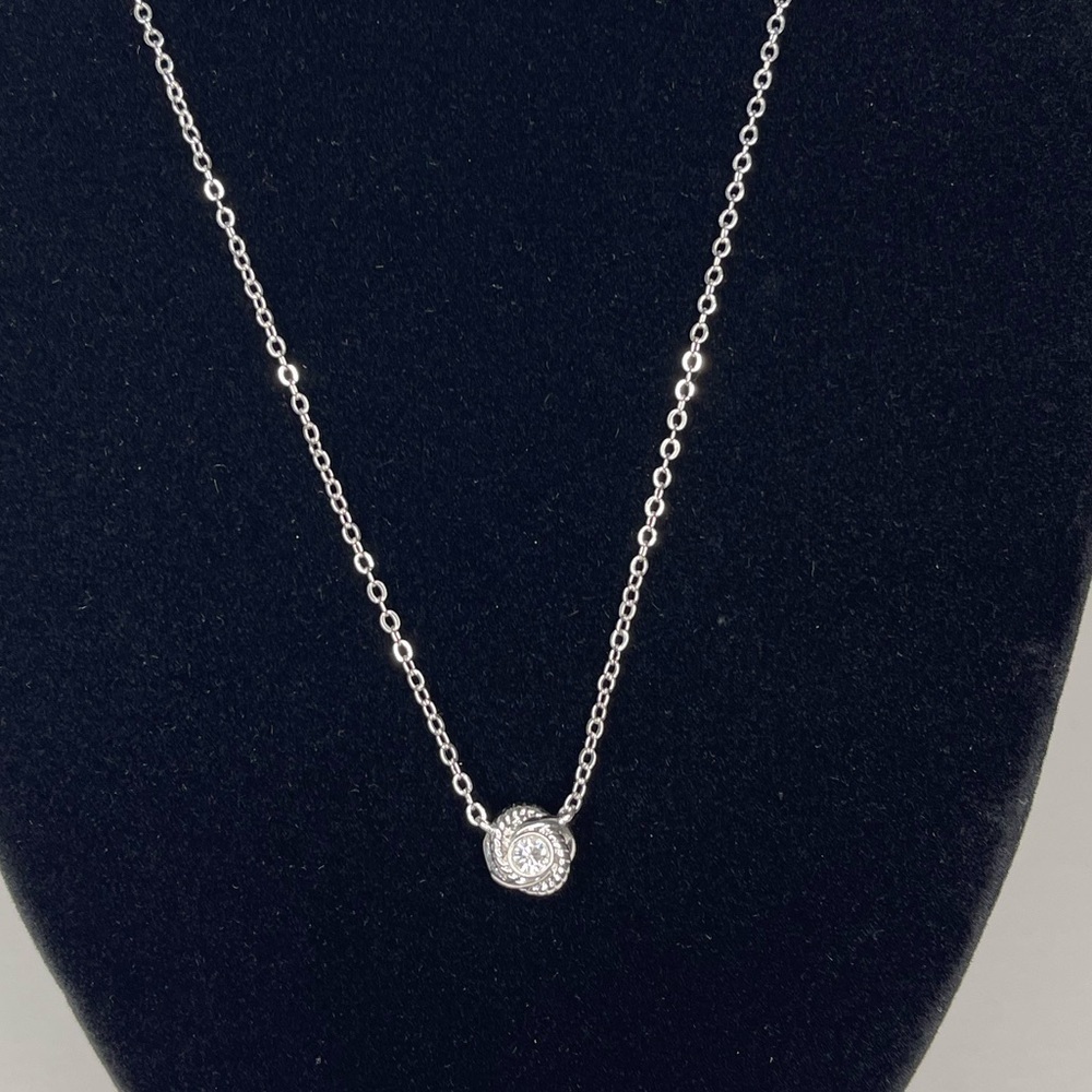 Kate Spade Infinity and Beyond Silver Tone Rhinestone Knot Pendant Necklace - Picture 4 of 12